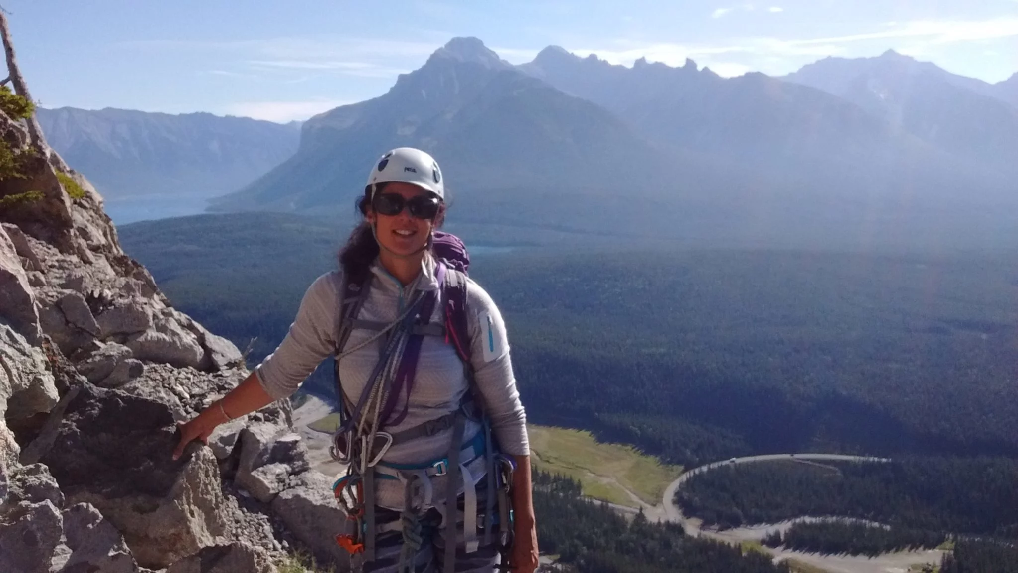 Woman rock climbing in Banff, Canada