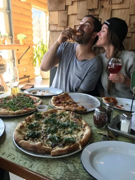 Two People Eating Pizza Posthike