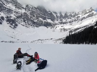 Snowshoeing in Canadian backcountry amidst mountaints
