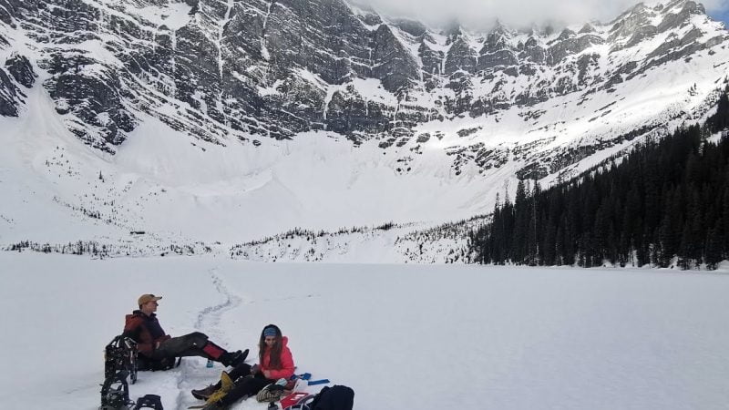 Snowshoeing In Canadian Backcountry Amidst Mountaints