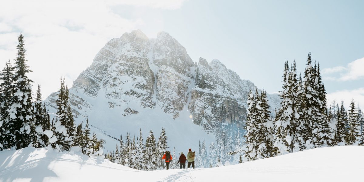 how to spend winter in banff and lake louise: snowshoeing under the mountains