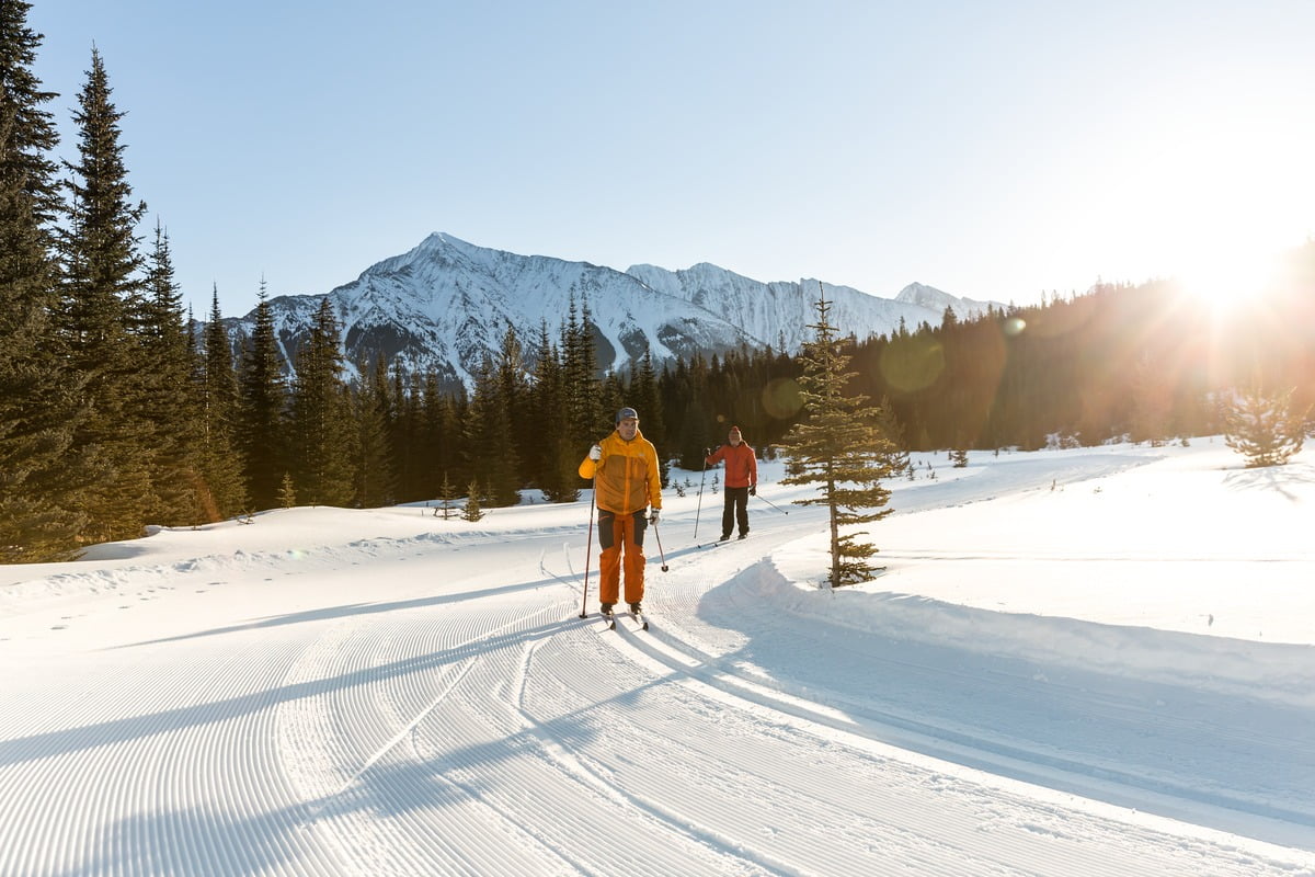 Two people cross country skiing in Canmore