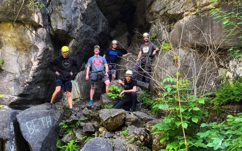 Group of men going caving at a bachelor party