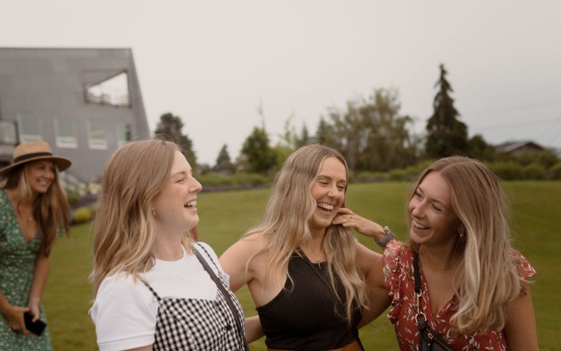 Four women laughing at a bachelorette party in Kelowna