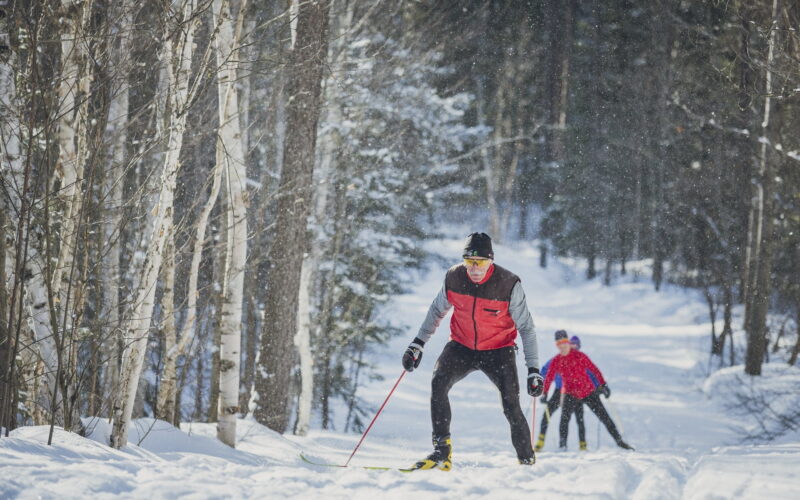 Man and woman nordic skiing in Ontario in winter